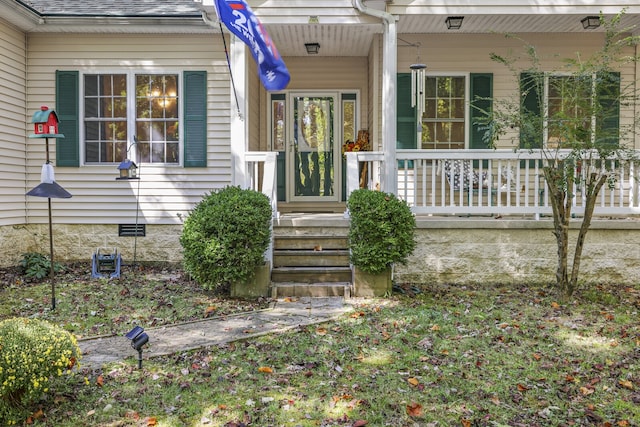 entrance to property with covered porch