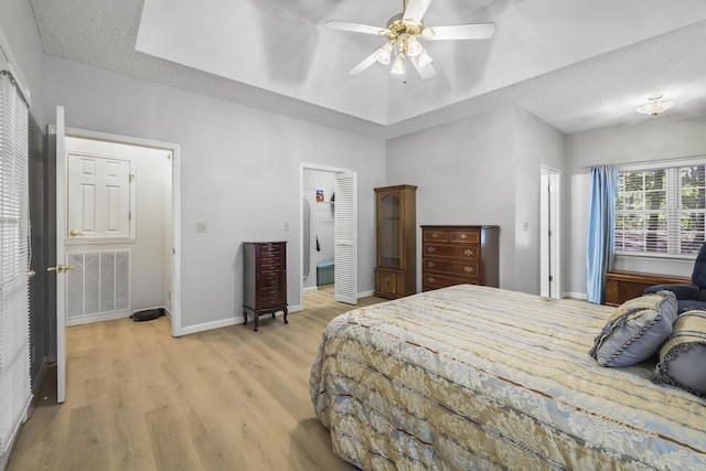 455 Bluff View Dr, Spencer, TN 38585 - bedroom with light wood-style flooring, baseboards, and a ceiling fan