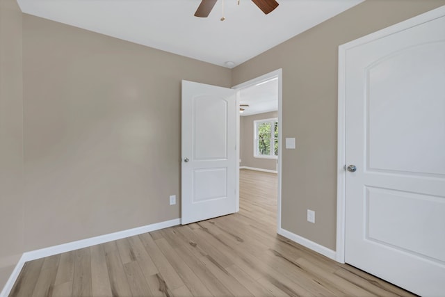 interior space with light wood-type flooring and ceiling fan