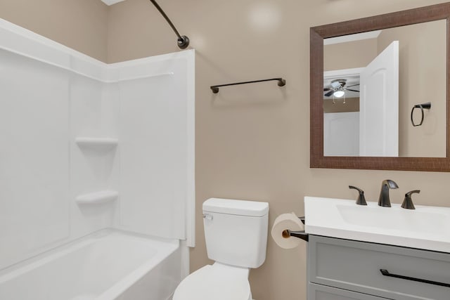 full bathroom with shower / bath combination, vanity, and toilet