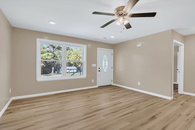 entrance foyer with ceiling fan and light hardwood / wood-style floors