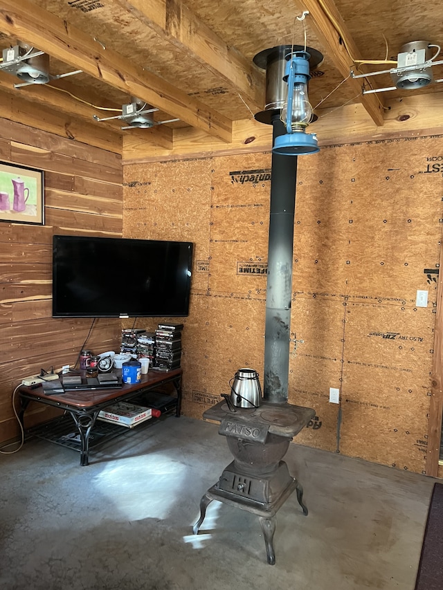 unfurnished living room with concrete floors