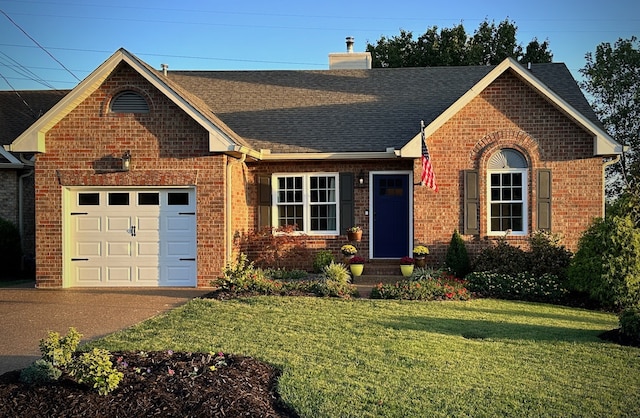 ranch-style house featuring a garage and a front yard