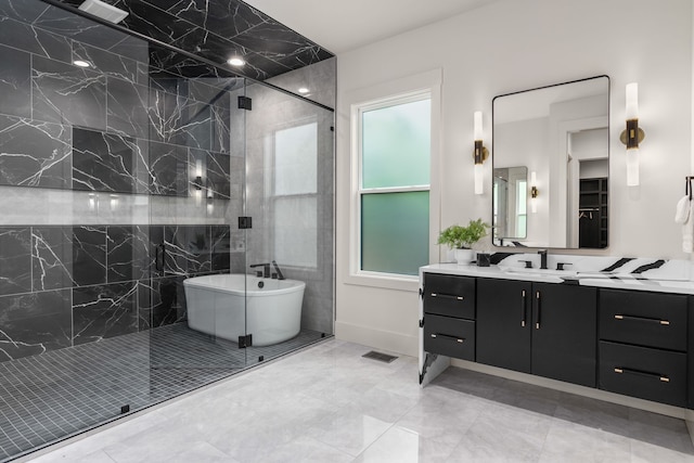 bathroom featuring tile walls, vanity, and independent shower and bath