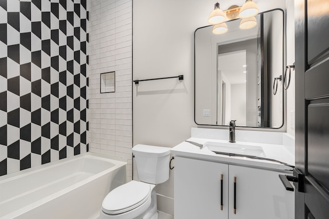 full bathroom featuring tiled shower / bath combo, vanity, and toilet