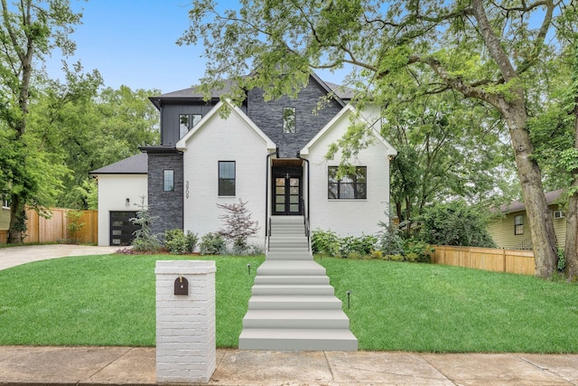 view of front of home with a front yard