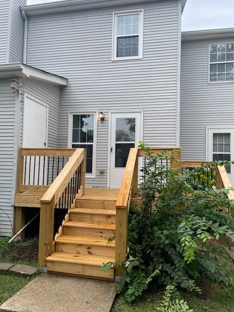 doorway to property with a wooden deck