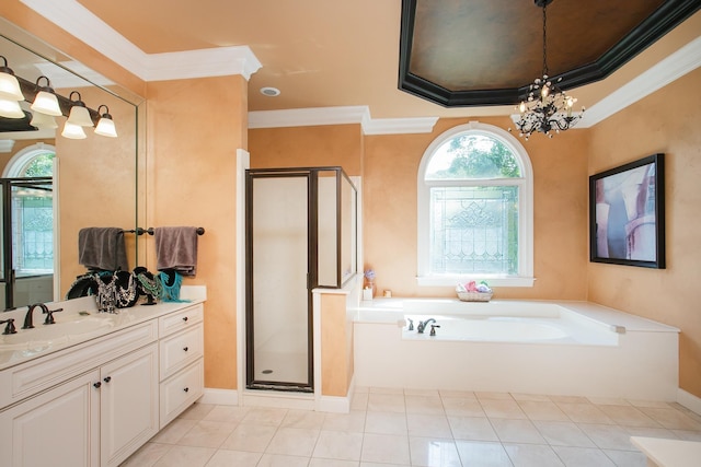 bathroom featuring tile patterned floors, crown molding, vanity, and plus walk in shower