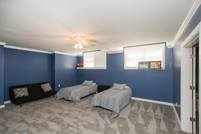 bedroom featuring crown molding, ceiling fan, and carpet