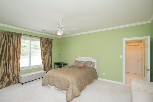 bedroom with ceiling fan, light colored carpet, and crown molding