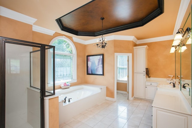 bathroom with a raised ceiling, crown molding, vanity, and independent shower and bath