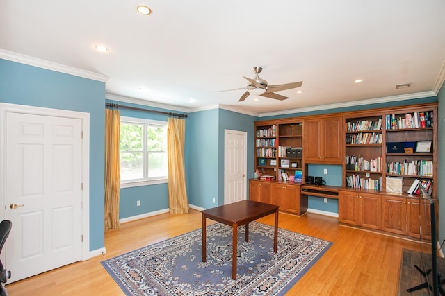 office space with ceiling fan, light hardwood / wood-style flooring, and ornamental molding