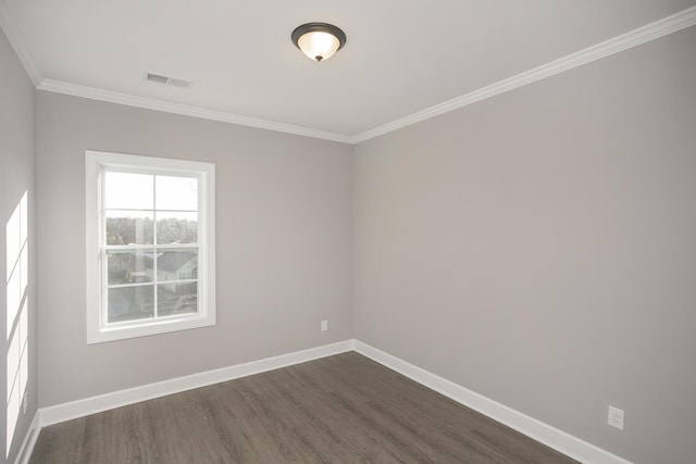 unfurnished room featuring crown molding and dark hardwood / wood-style flooring