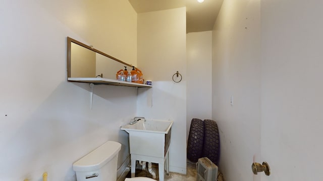 bathroom featuring toilet