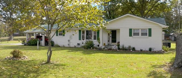 ranch-style house featuring a front yard