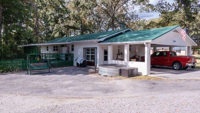 view of front of property featuring covered porch