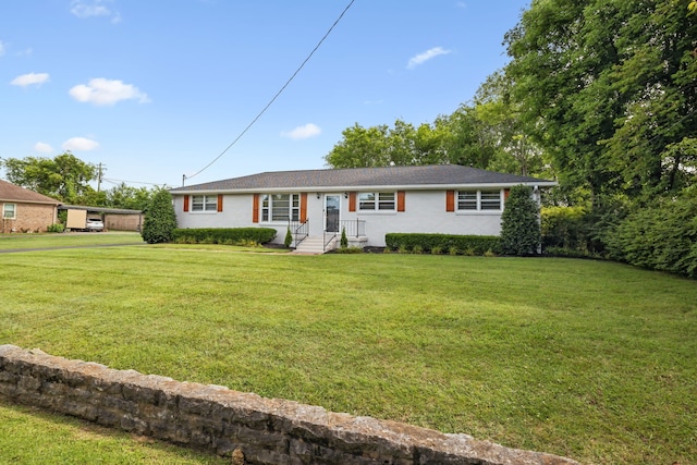 ranch-style house with a front yard