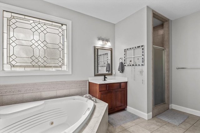 bathroom featuring vanity, tile patterned floors, and independent shower and bath