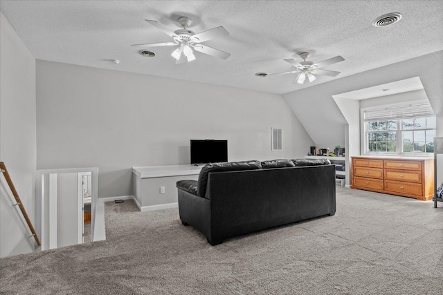 living room featuring ceiling fan, light colored carpet, and lofted ceiling