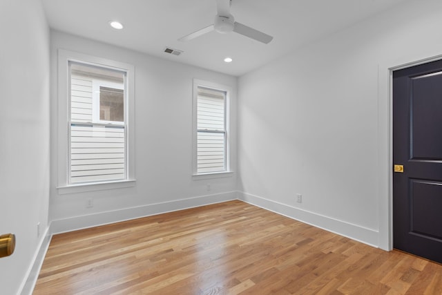 empty room featuring light hardwood / wood-style floors and ceiling fan