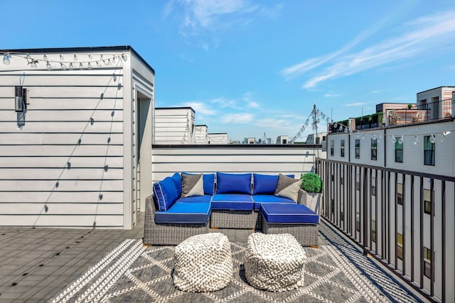 wooden terrace featuring outdoor lounge area