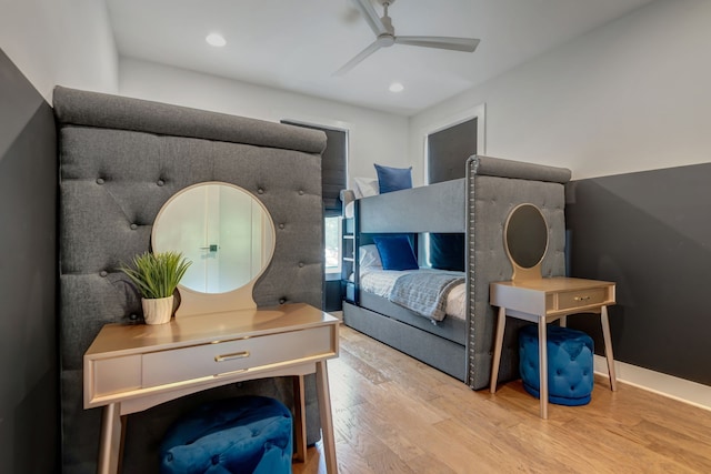 bedroom featuring ceiling fan and light hardwood / wood-style flooring