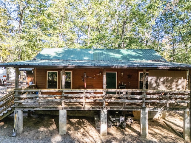 rear view of house with a deck