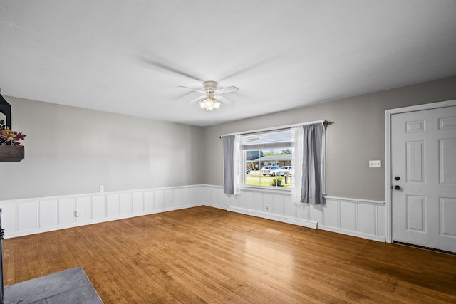 entrance foyer with wood-type flooring and ceiling fan