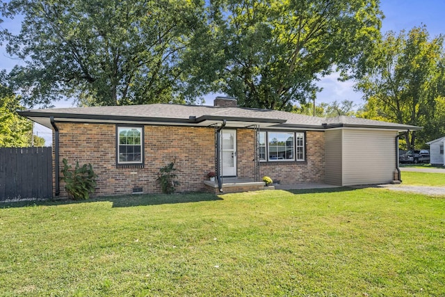 201 Lee Ave, Portland, TN 37148 - ranch-style home featuring crawl space, a chimney, a front yard, brick siding, and fence