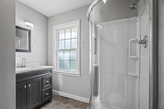 bathroom with vanity and walk in shower