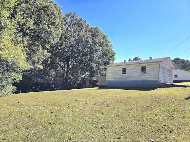 view of property exterior with a yard