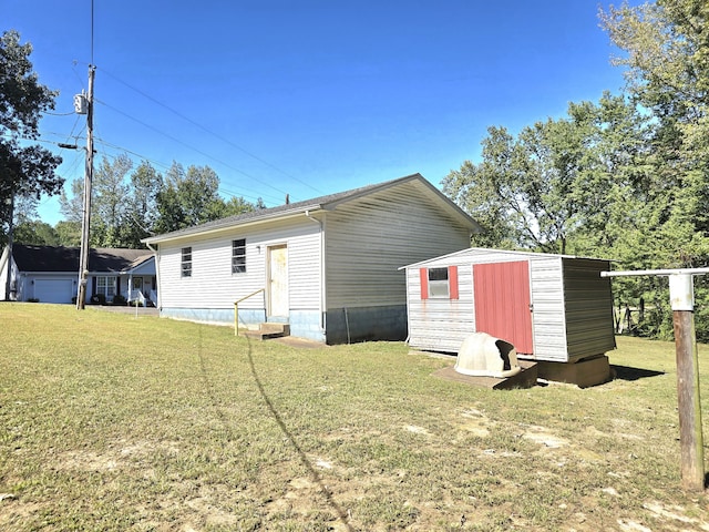 view of outdoor structure with a lawn