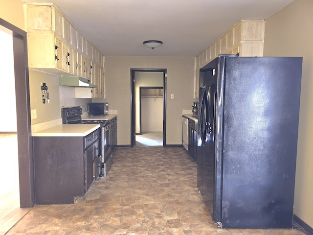 kitchen featuring light brown cabinetry and black appliances