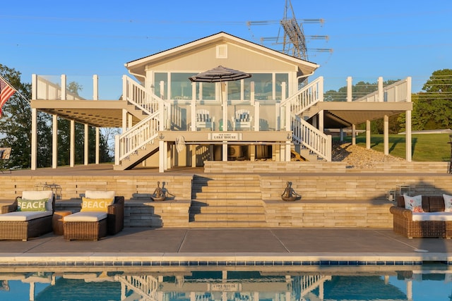 back of property featuring a patio and a sunroom