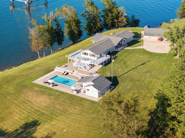 birds eye view of property with a water view