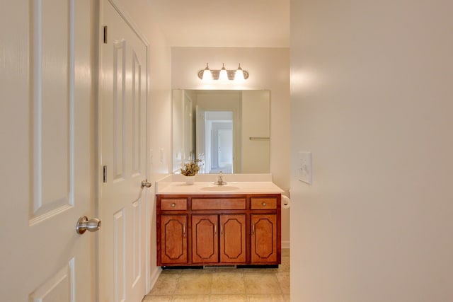 bathroom with vanity and tile patterned flooring