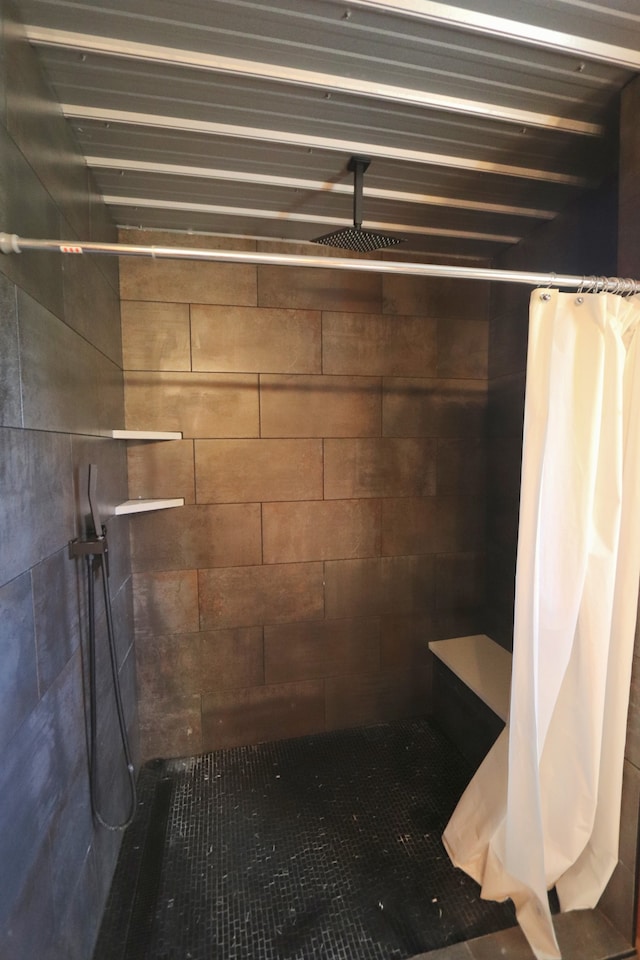 bathroom with a shower with shower curtain