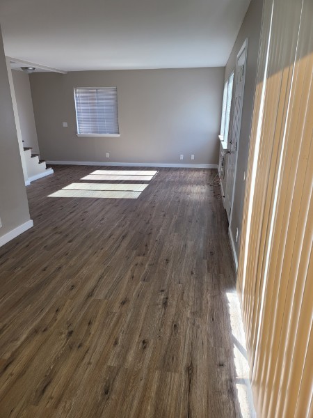 empty room featuring dark hardwood / wood-style floors