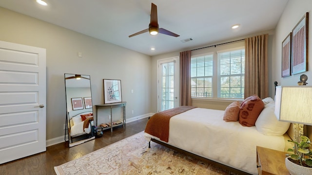 bedroom featuring ceiling fan and dark wood-type flooring