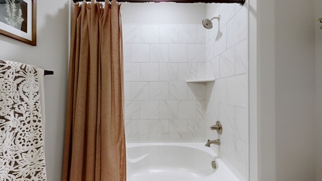 bathroom with shower / bath combo