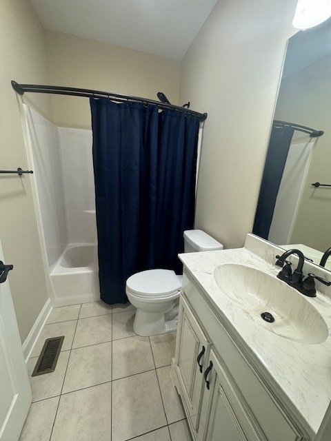 full bathroom featuring vanity, shower / tub combo, toilet, and tile patterned flooring