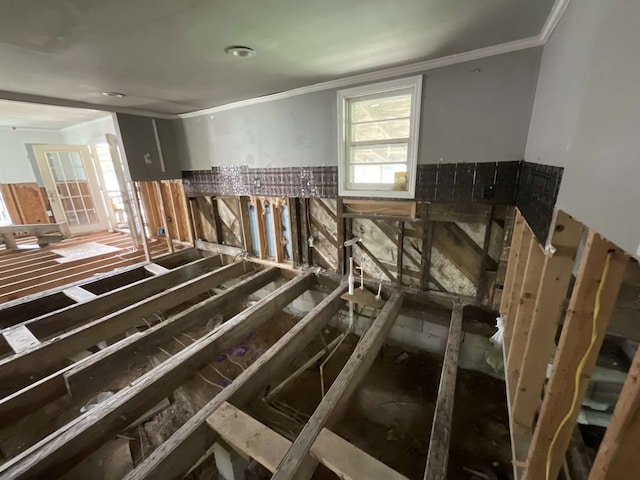 miscellaneous room with crown molding