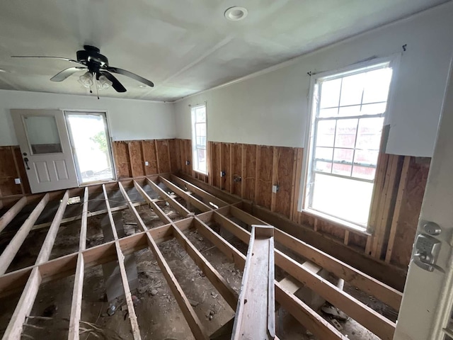 unfurnished room featuring ceiling fan