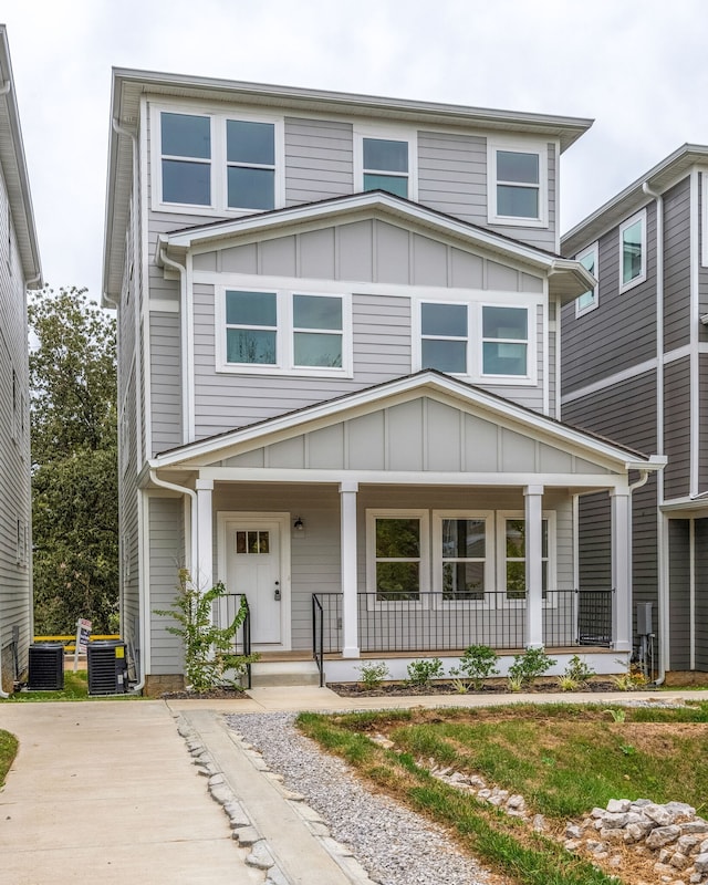 view of front of home with central AC unit and covered porch