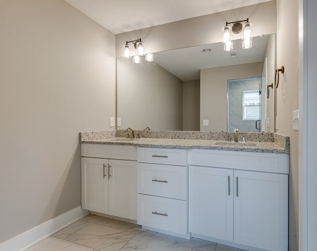 bathroom featuring vanity and a shower