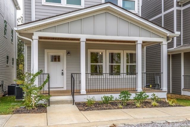 exterior space with cooling unit and covered porch