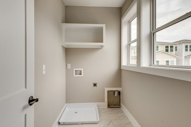 laundry area with washer hookup and hookup for an electric dryer