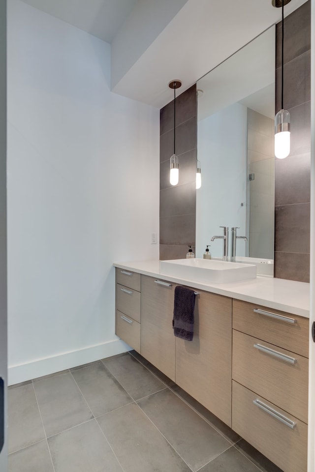 bathroom featuring tile patterned floors and vanity