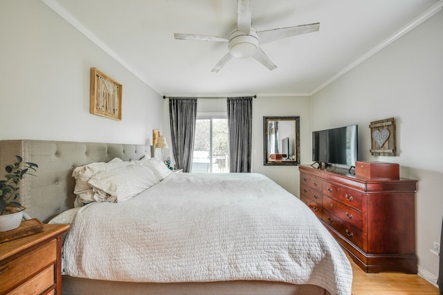 bedroom featuring ornamental molding, light wood-type flooring, and ceiling fan