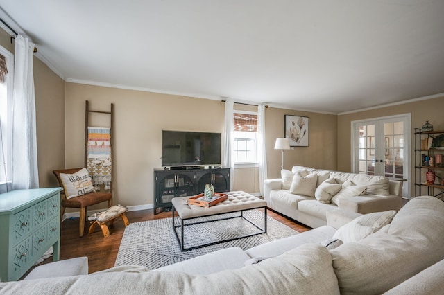 living room featuring ornamental molding, french doors, and dark hardwood / wood-style flooring